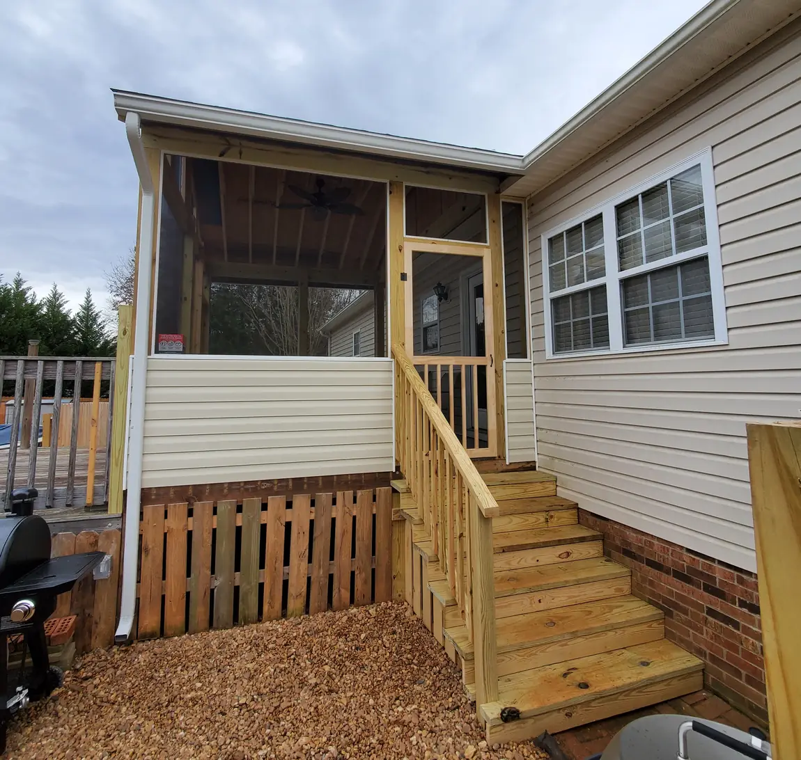 Screened porch addition with vinyl kneewall, new wood screen door and pressure-treated stairs